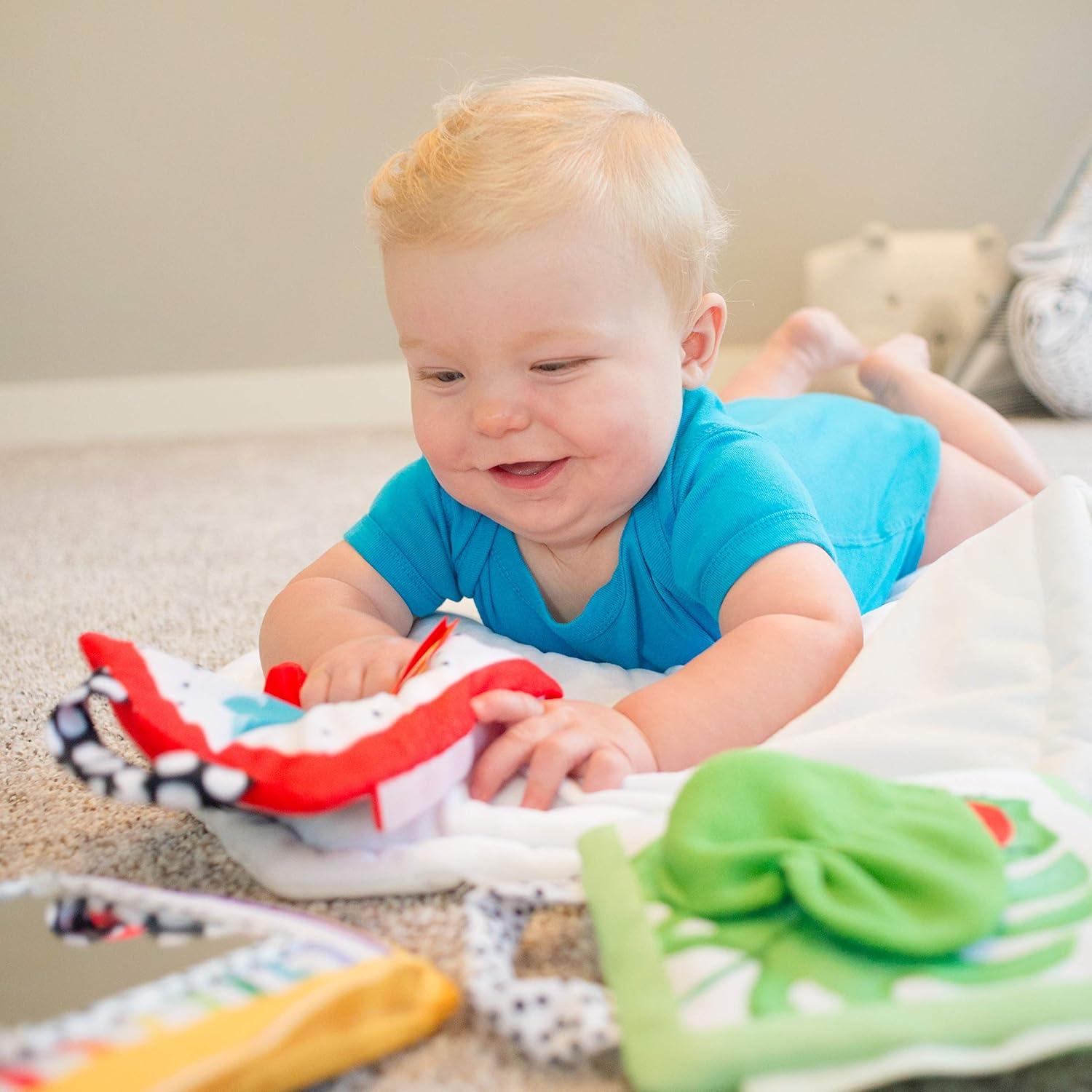 image:imageSassy PeekaBoo Activity Book with Attachable Link for OnTheGo Travel Sensory Play Black amp White Ages 0 MonthsReversible Soft Sensory Activity Panels 4ct